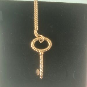 Rose gold chain with rose gold key